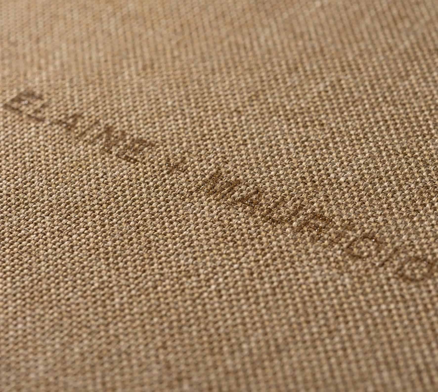Têxtil parda com logo estampada marca Fotoclub, material de alta qualidade.